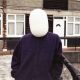 Portrait of Artist David Blackmore wearing his CCTV mask (2010)